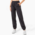 Pantalones de jogger de cintura elástica Mujeres Strips de chándal seco rápido